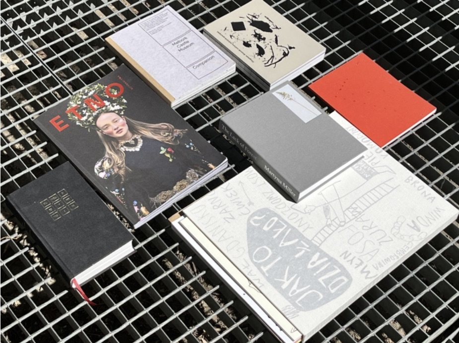 Art and design books laid out at the Most Beautiful Polish Books exhibition